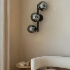 Aplique Lindby Orbelia, negro, 3 luces, cristal, G9