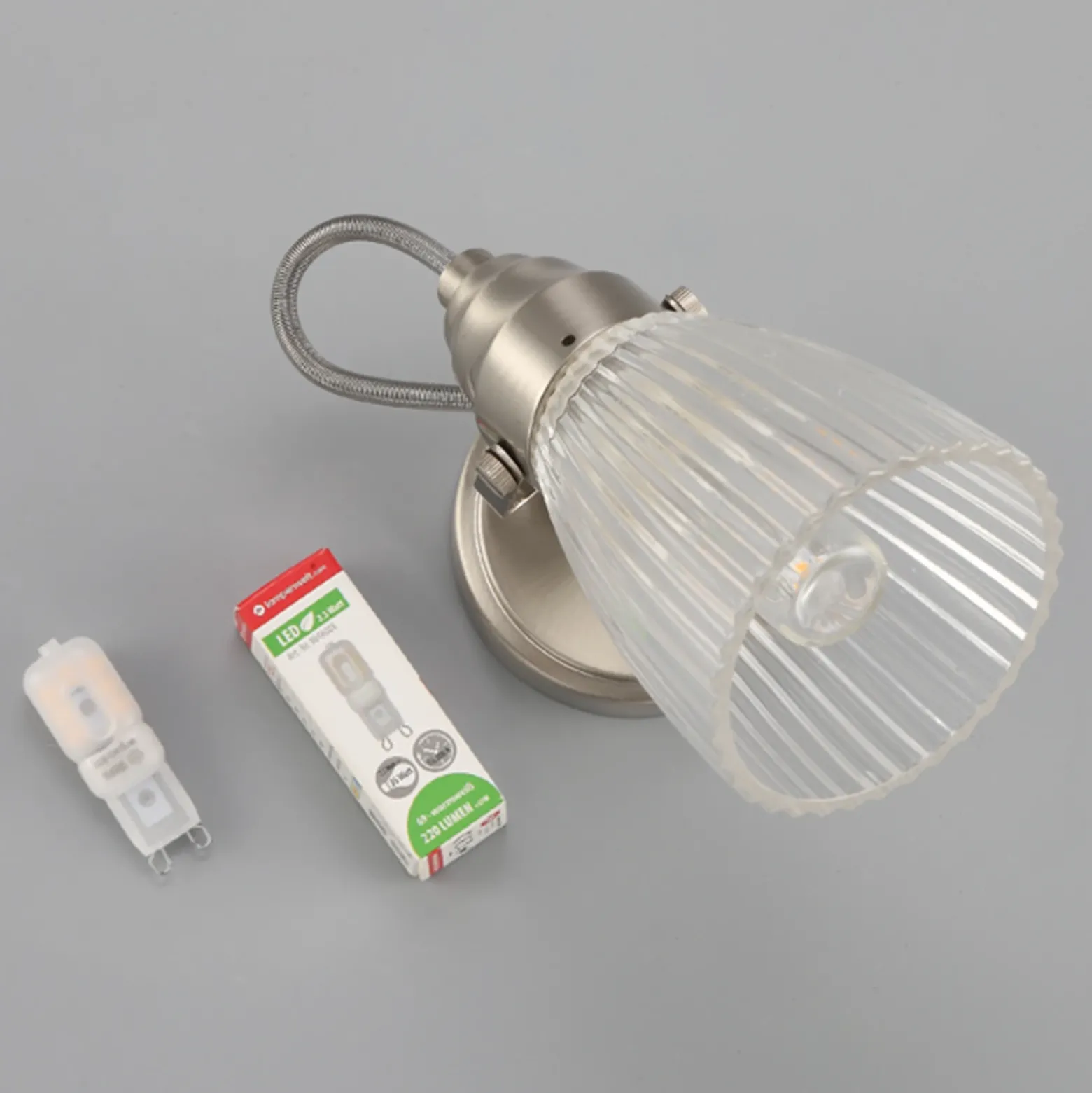 Aplique para baño Lindby Kara, 21 cm de altura, cristal, IP44, G9