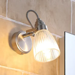 Aplique para baño Lindby Kara, 21 cm de altura, cristal, IP44, G9