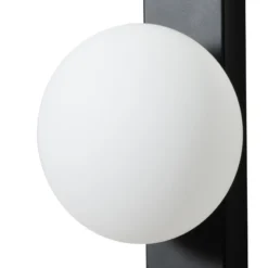 Aplique para baño Lindby Tavrik, negro/blanco, altura 30 cm, cristal