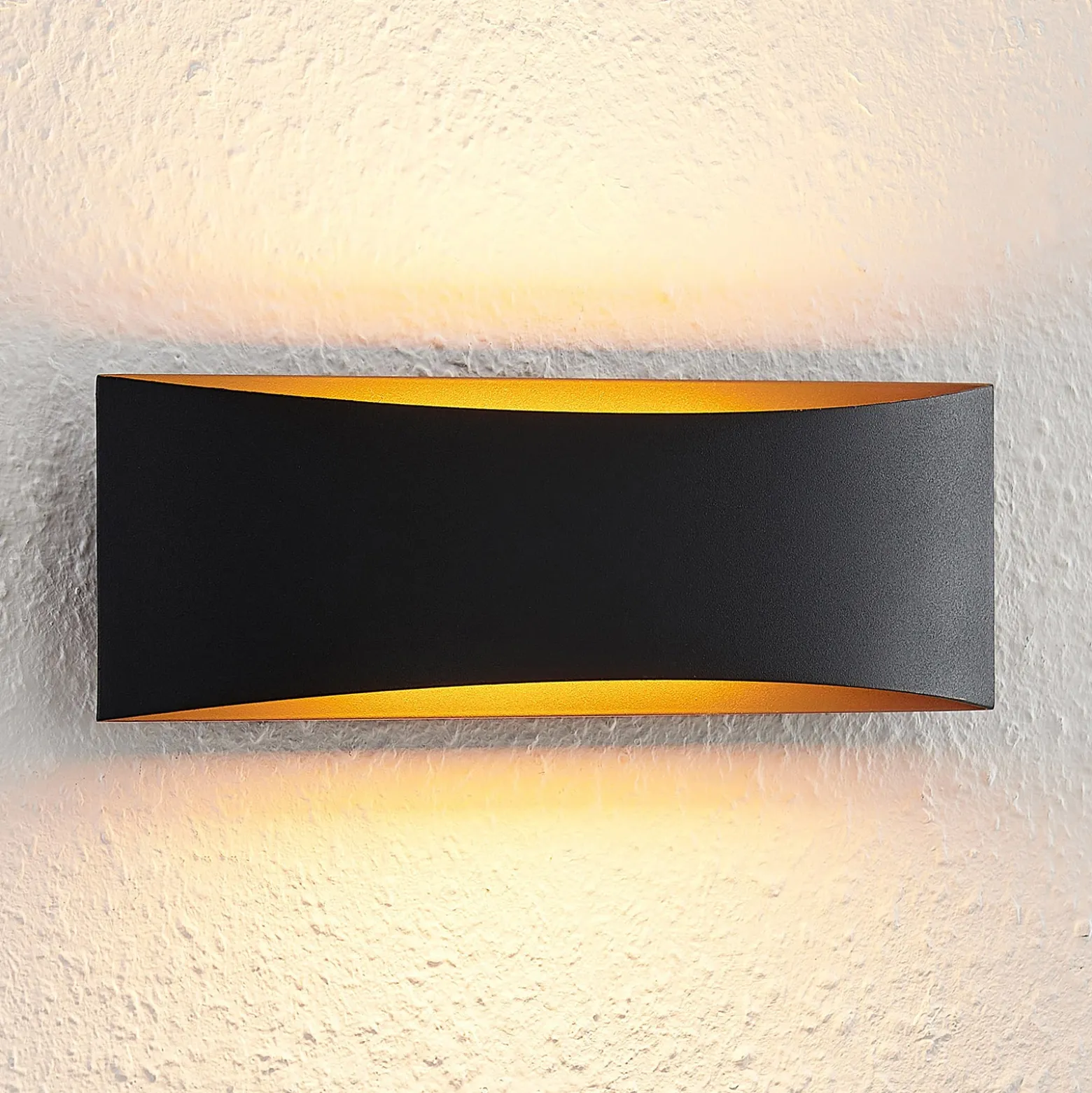 Arcchio Aplique de pared LED Jelle, 27 cm, negro/oro, arriba/abajo