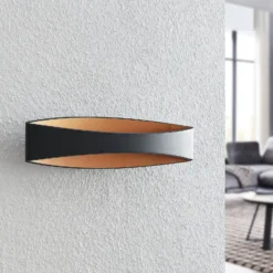 Arcchio Aplique de pared LED Jelle, 44 cm, negro/oro, arriba/abajo