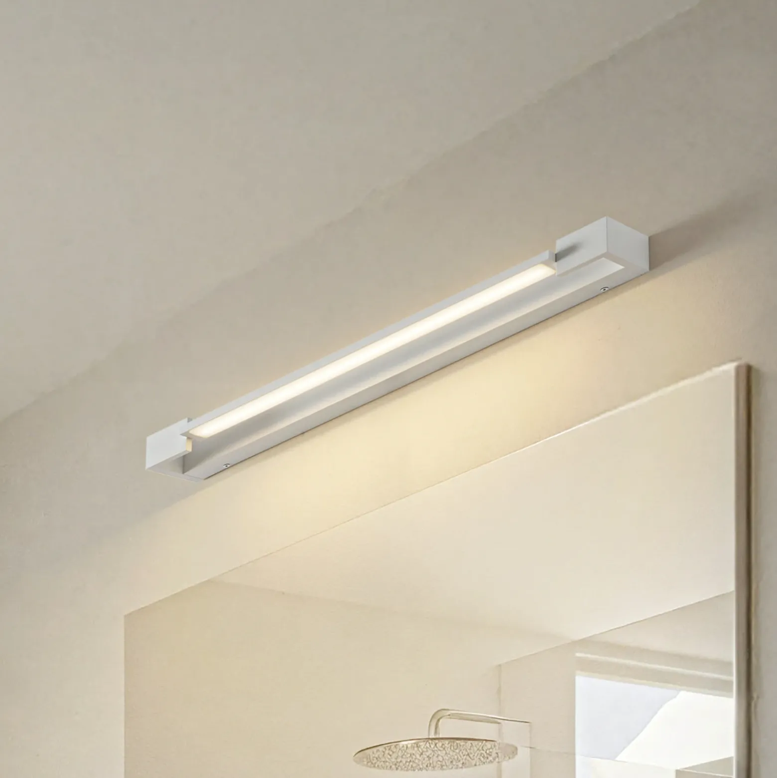 Arcchio Aplique de pared LED Jora, 60 cm, blanco, orientable, IP44