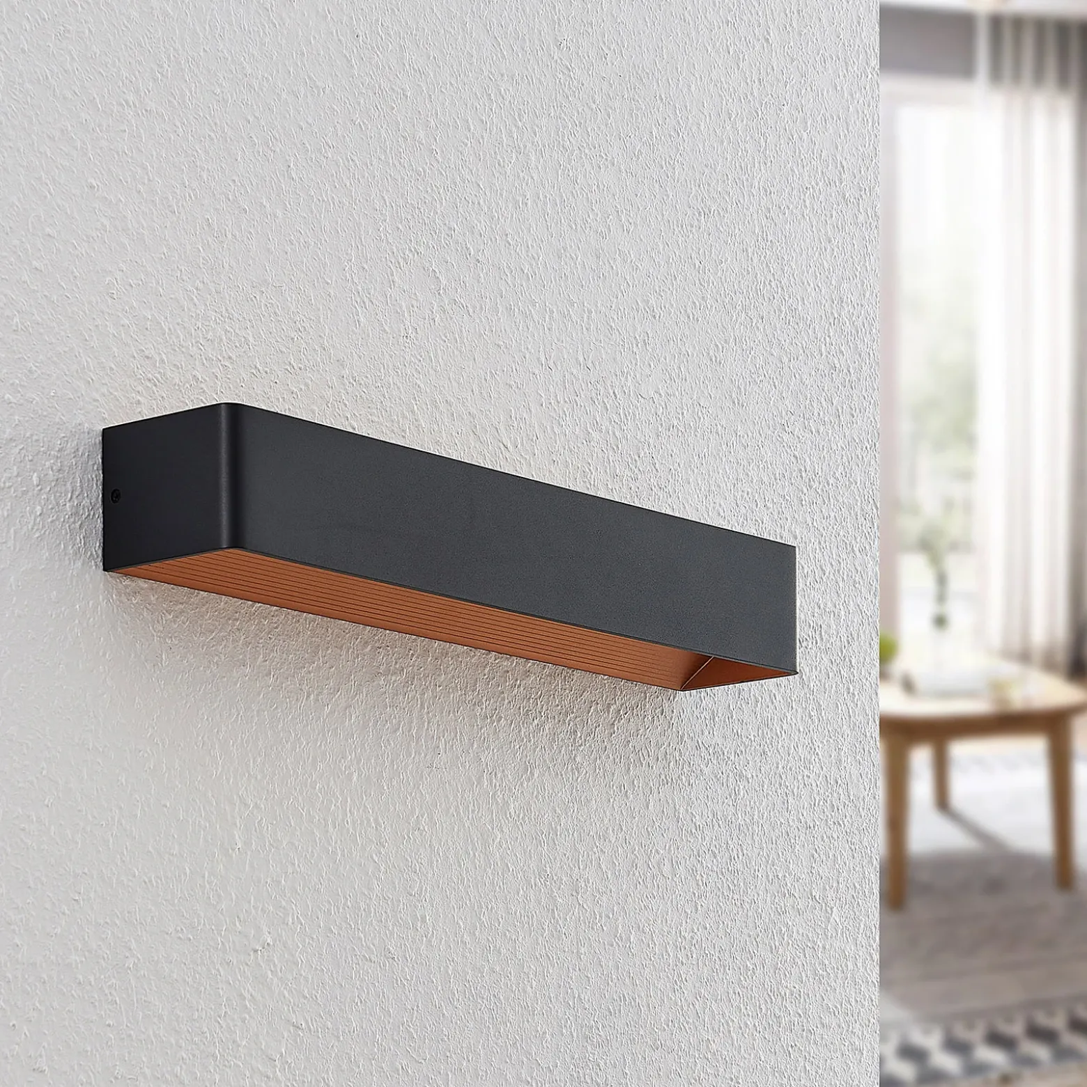 Arcchio Aplique de pared LED Karam, 53 cm, negro, metal, arriba/abajo