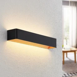 Arcchio Aplique de pared LED Karam, 53 cm, negro, metal, arriba/abajo