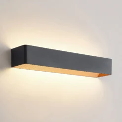 Arcchio Aplique de pared LED Karam, 53 cm, negro, metal, arriba/abajo