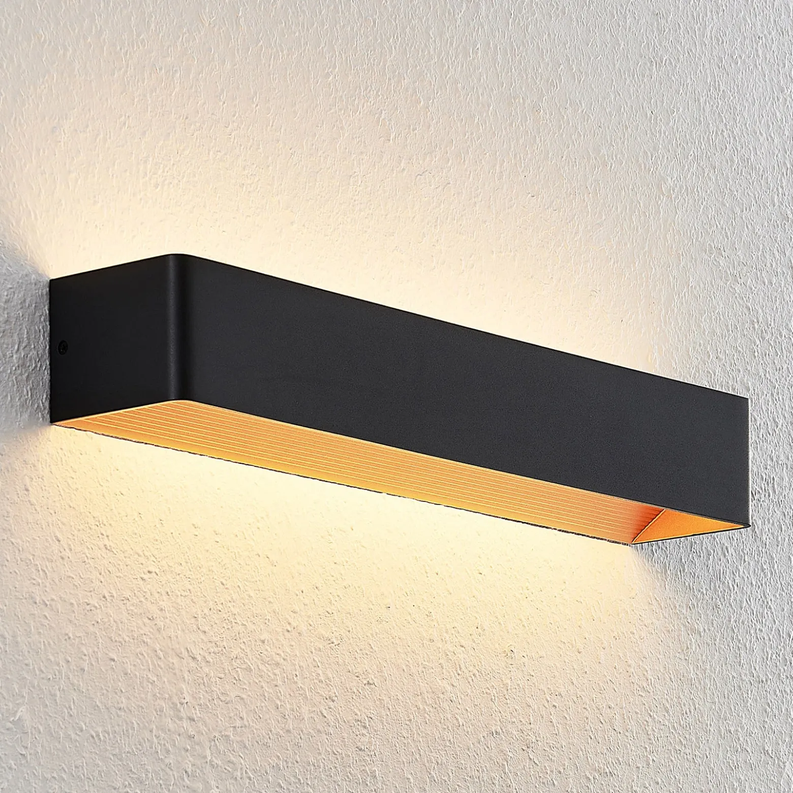 Arcchio Aplique de pared LED Karam, 53 cm, negro, metal, arriba/abajo
