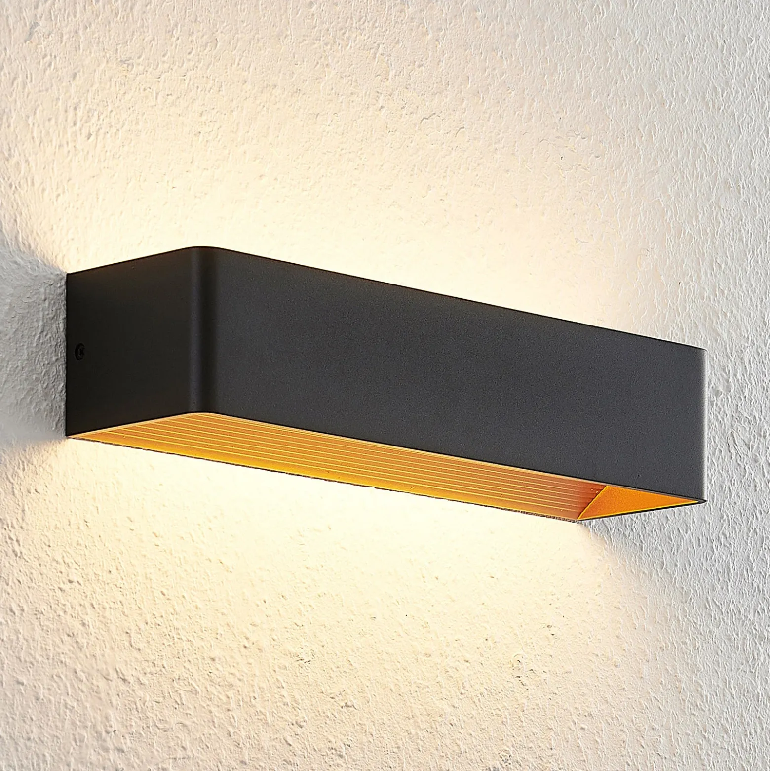 Arcchio Aplique de pared LED Karam, 37 cm, negro, metal, arriba/abajo