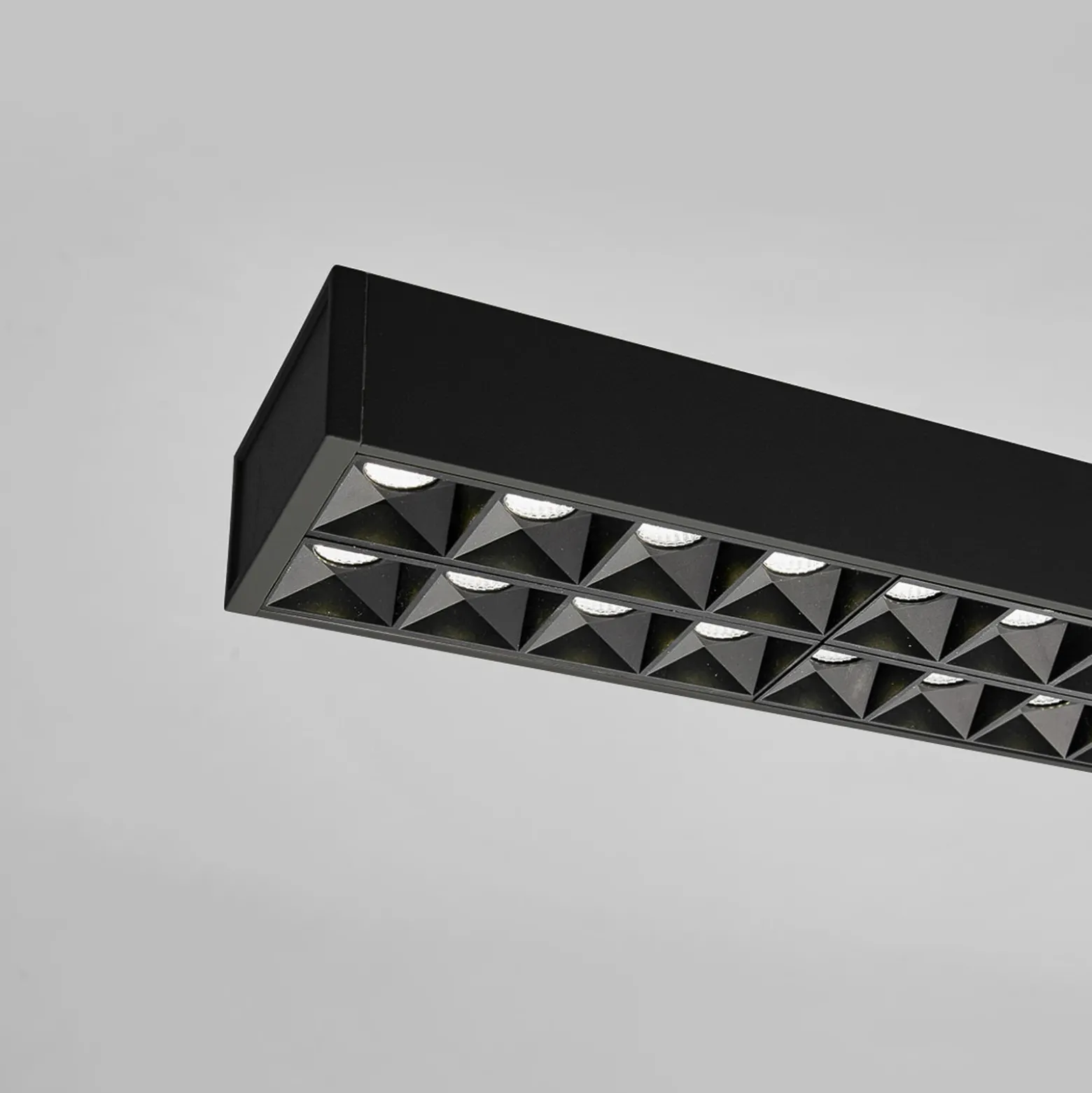 Arcchio lámpara colgante LED de oficina Jolinda, negra, 118cm, arriba/abajo
