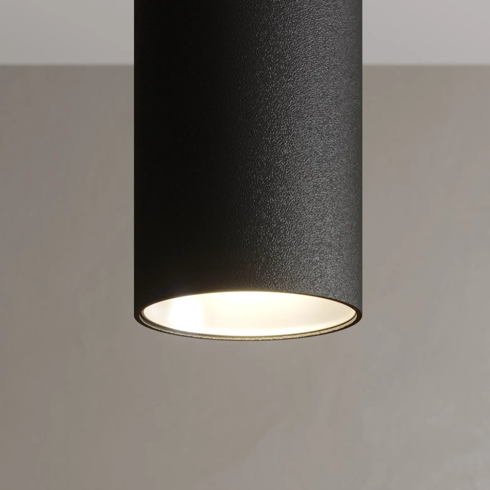 Arcchio Lámpara colgante LED Franka, 3 luces, larga, negra, aluminio