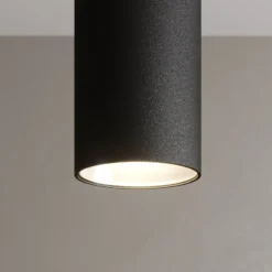 Arcchio Lámpara colgante LED Franka, 3 luces, larga, negra, aluminio