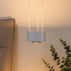 Arcchio Lámpara colgante LED Rotari, lente, arriba/abajo, blanca