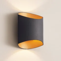 Arcchio Vilja aplique, negro, oro, ovalado