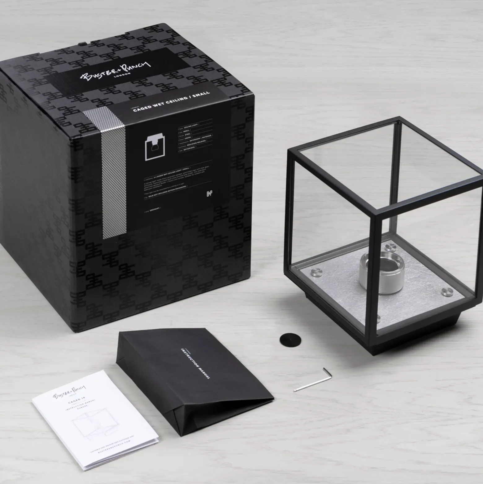 Buster + Punch Caged Wet Small IP44 acero