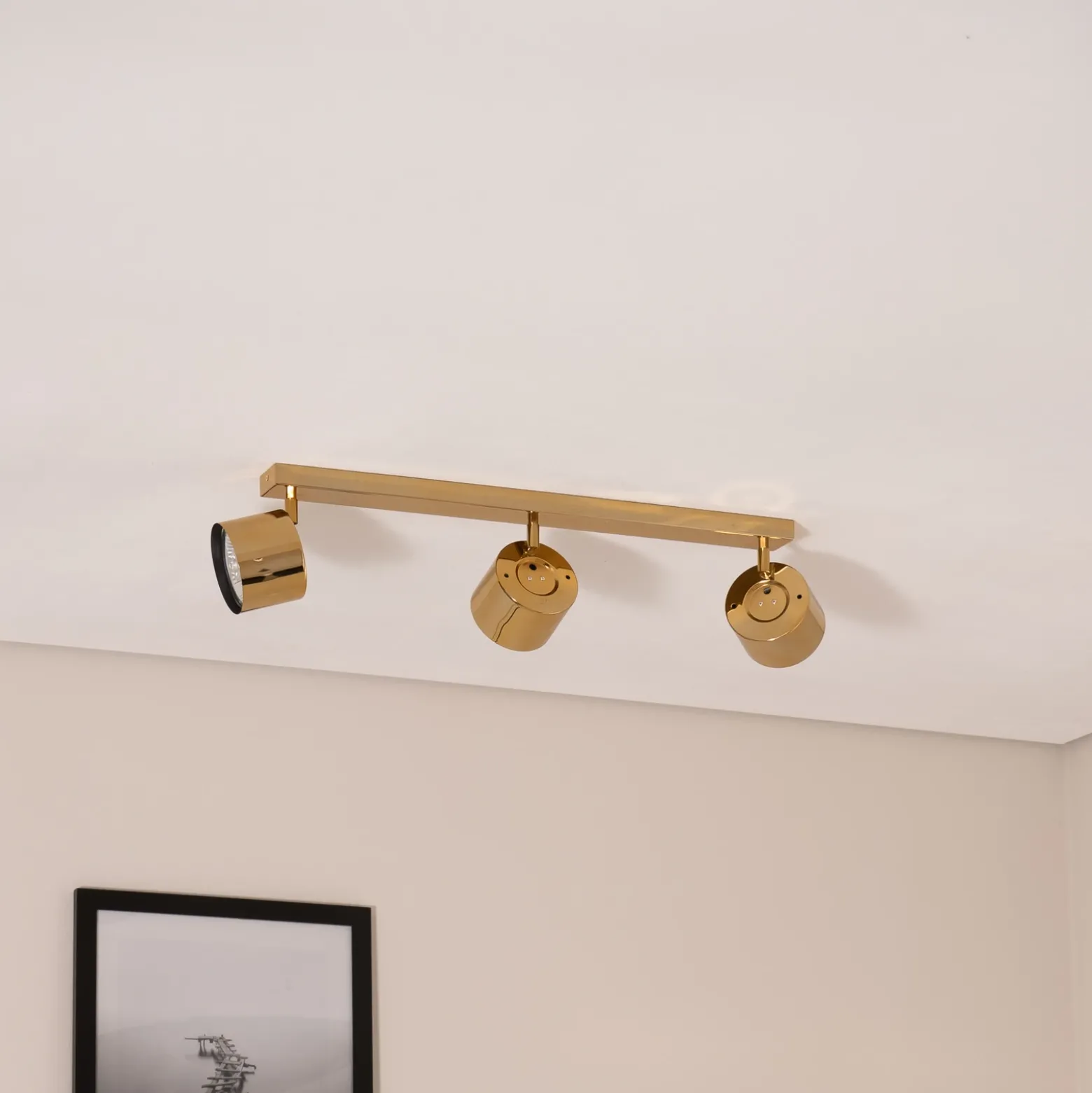 Downlight Chloe orientable, 3 luces, acero color latón