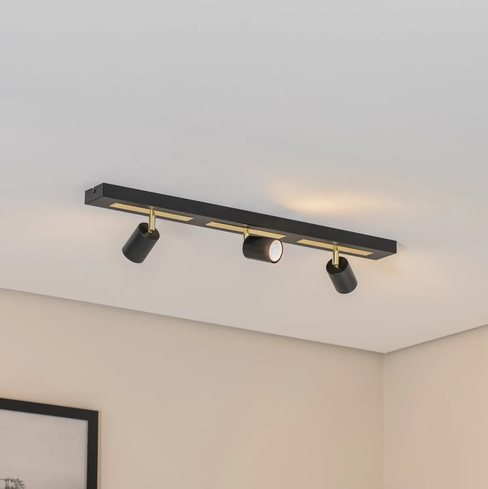 Downlight Rodez, negro/dorado, longitud 80 cm, 3 luces.