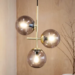 Dyberg Larsen Lámpara colgante Como, 3 luces, latón