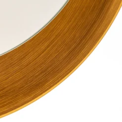 Espejo LED Bega Studio Line negro-latón, Ø 50 cm