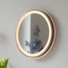 Espejo LED de pared VIDRO, bronce, Ø 36 cm, batería externa, interruptor