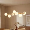 Estera lámpara colgante, cristal opalino, madera, 7 luces