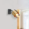 Foco de pared Milley, altura 17 cm, color latón, metal