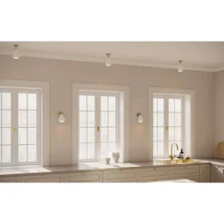 Foco empotrable Nuura Anoli Spot Recessed, Ø 10 cm, blanco/dorado