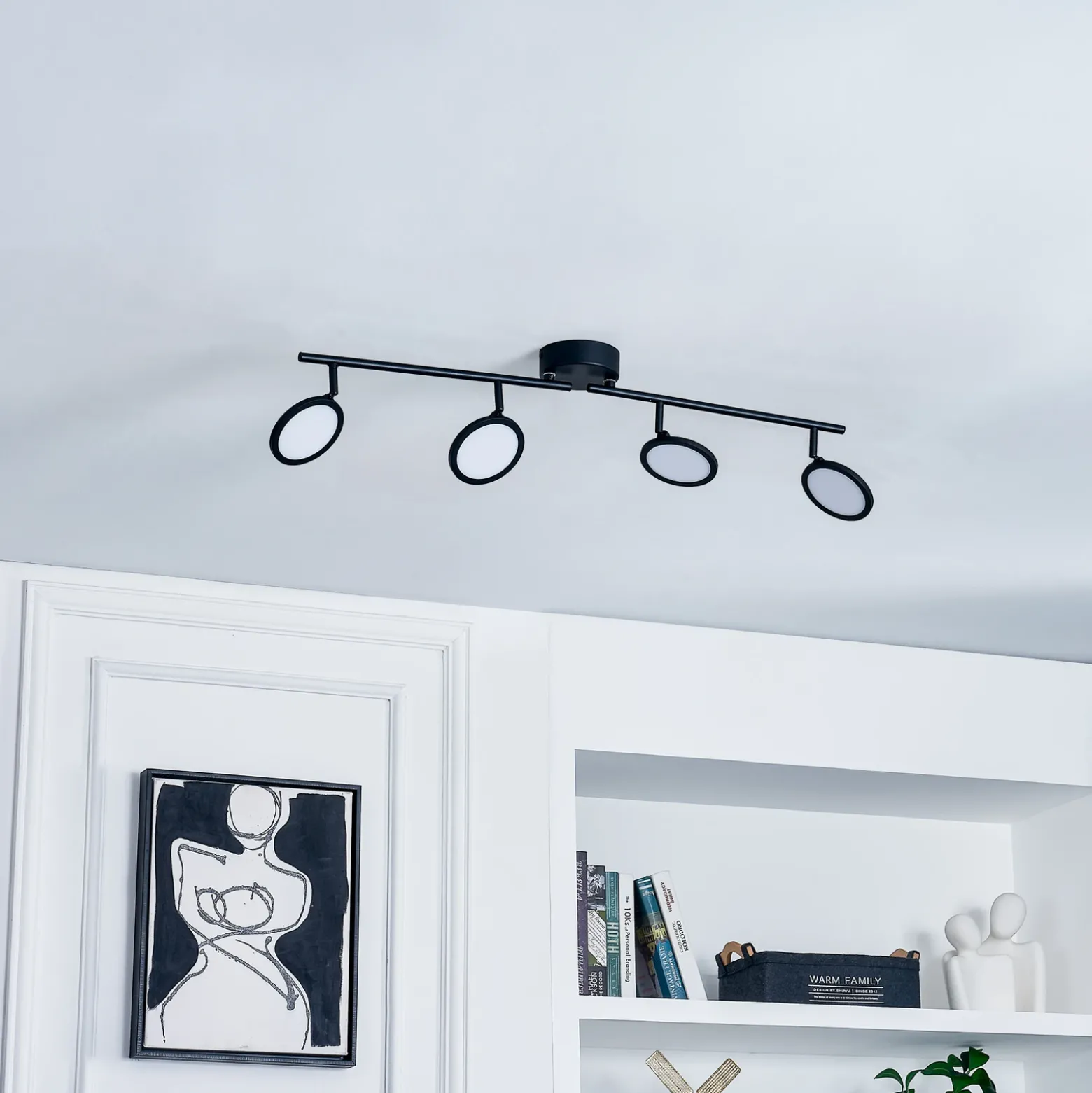Lindby foco LED Manel, negro, hierro, 82 cm de largo, 4 luces.