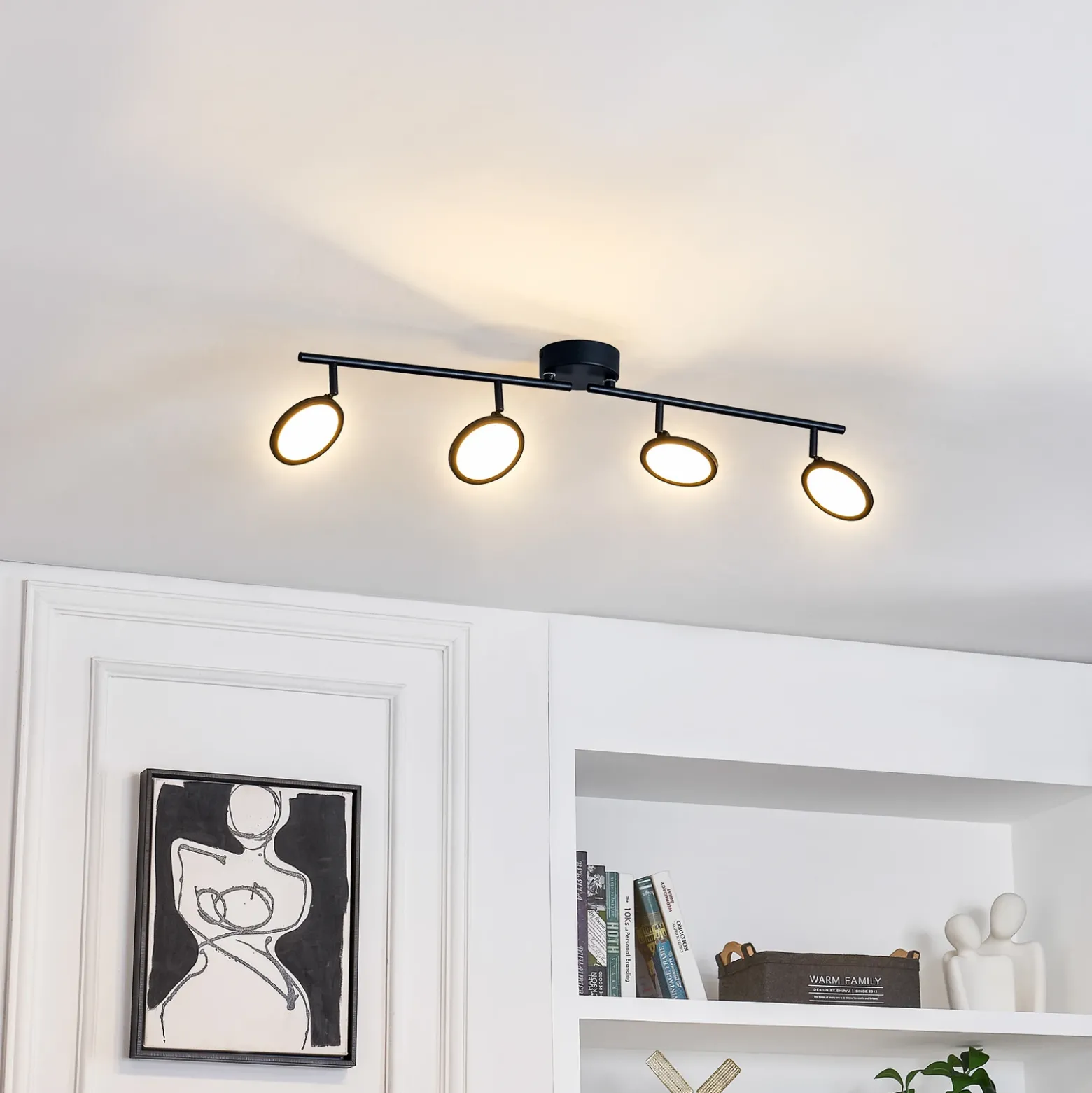 Lindby foco LED Manel, negro, hierro, 82 cm de largo, 4 luces.