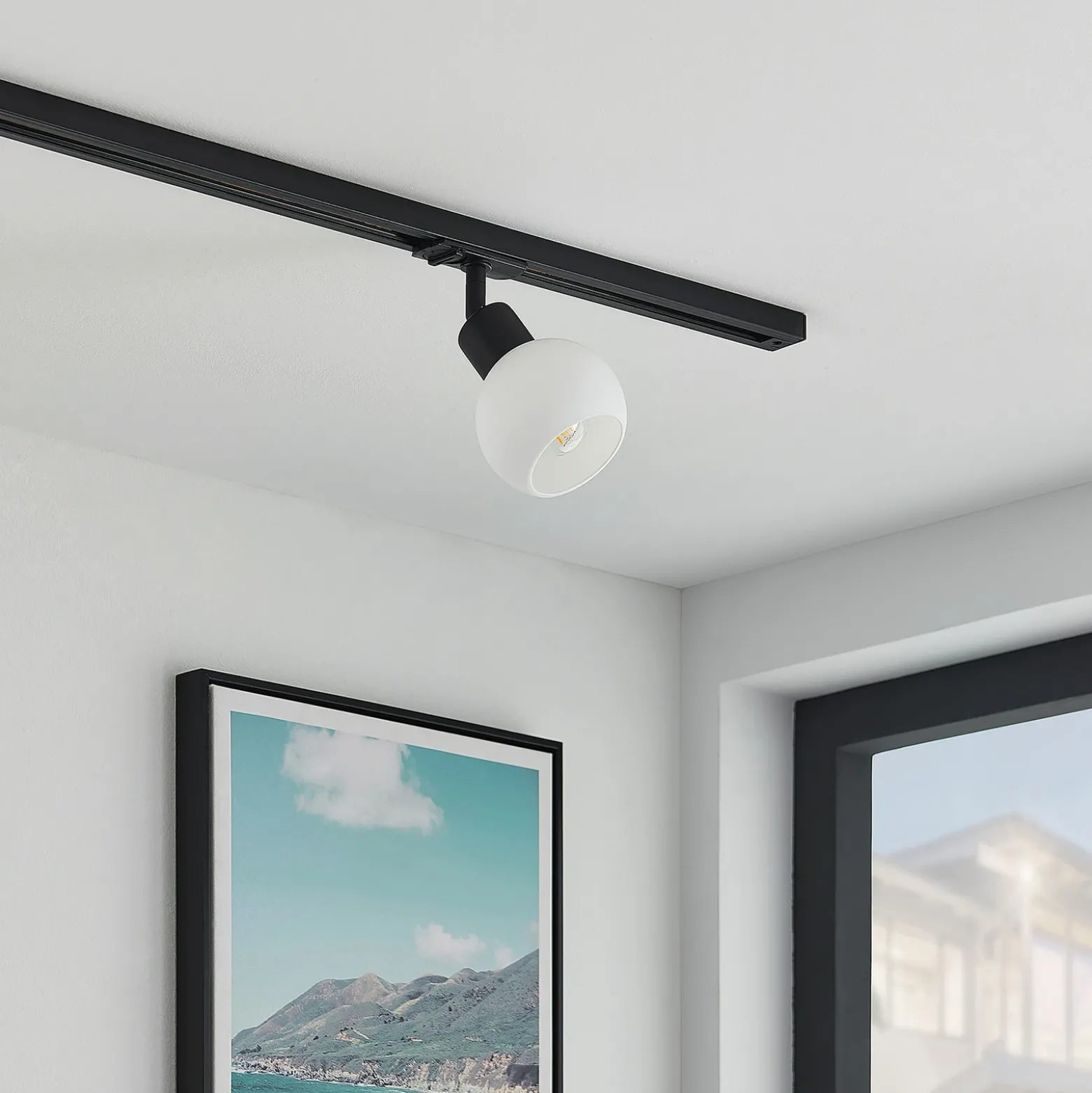 Lindby Linaro foco de riel, E14, negro, Ø 10 cm, 1 fase