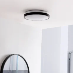 Lindby Lámpara de techo LED Medon Ø 29 cm plástico negro IP44