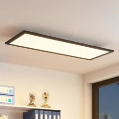 Lindby Panel LED Nelios, 80 x 30 cm, CCT, negro, metal