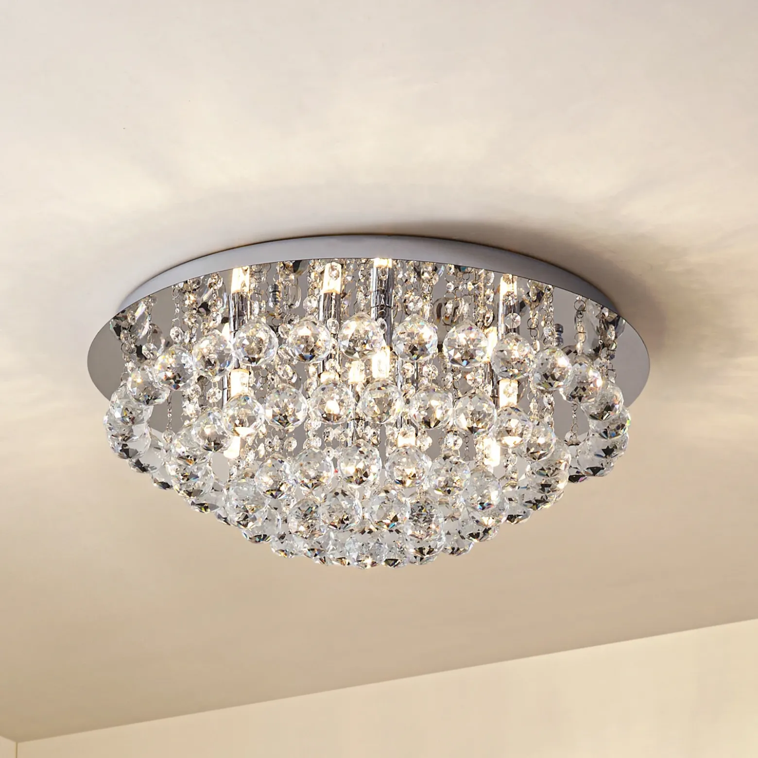 Lindby plafón Antonino, 8 luces, cromo, cristal, 55cm