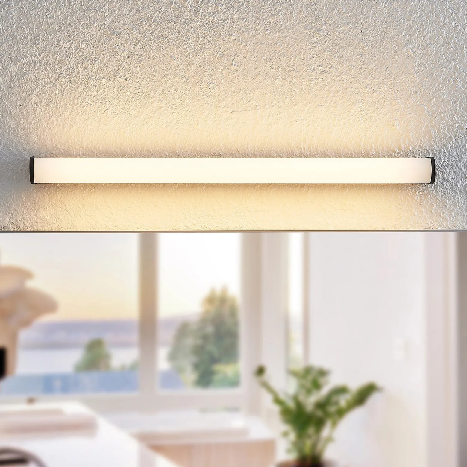 Lindby Ulisan aplique LED de baño, redondo 58,8 cm