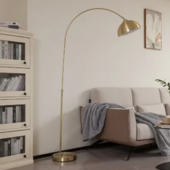 Lámpara arqueada Lennart de Lindby, latón, altura regulable, E27