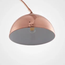 Lámpara arqueada Lennart de Lindby, de cobre, regulable en altura, E27