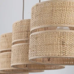 Lámpara colgante Calma, 4 luces, beige, rafia, longitud 95 cm
