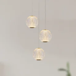 Lámpara colgante Cintra LED, Ø 25 cm, transparente/oro, acrílico