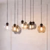 Lámpara colgante Cubus, 68 cm, 8 luces, transparente/miel/marrón, cristal