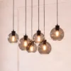 Lámpara colgante Cubus, gris humo, cristal, 74 cm de largo, 6 luces