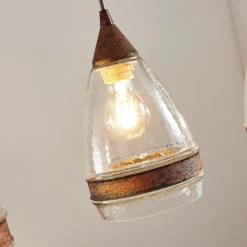 Lámpara colgante de cristal Lindby Millina, 70 cm, marrón óxido, 3 luces.