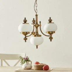 Lámpara colgante Delia, latón envejecido, 4 luces