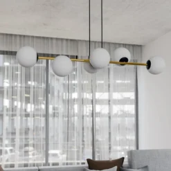 Lámpara colgante Gravity, blanco opalino/dorado/negro, cristal, E14