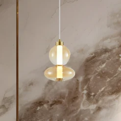Lámpara colgante LED Daphne, cristal ámbar transparente, altura 28 cm
