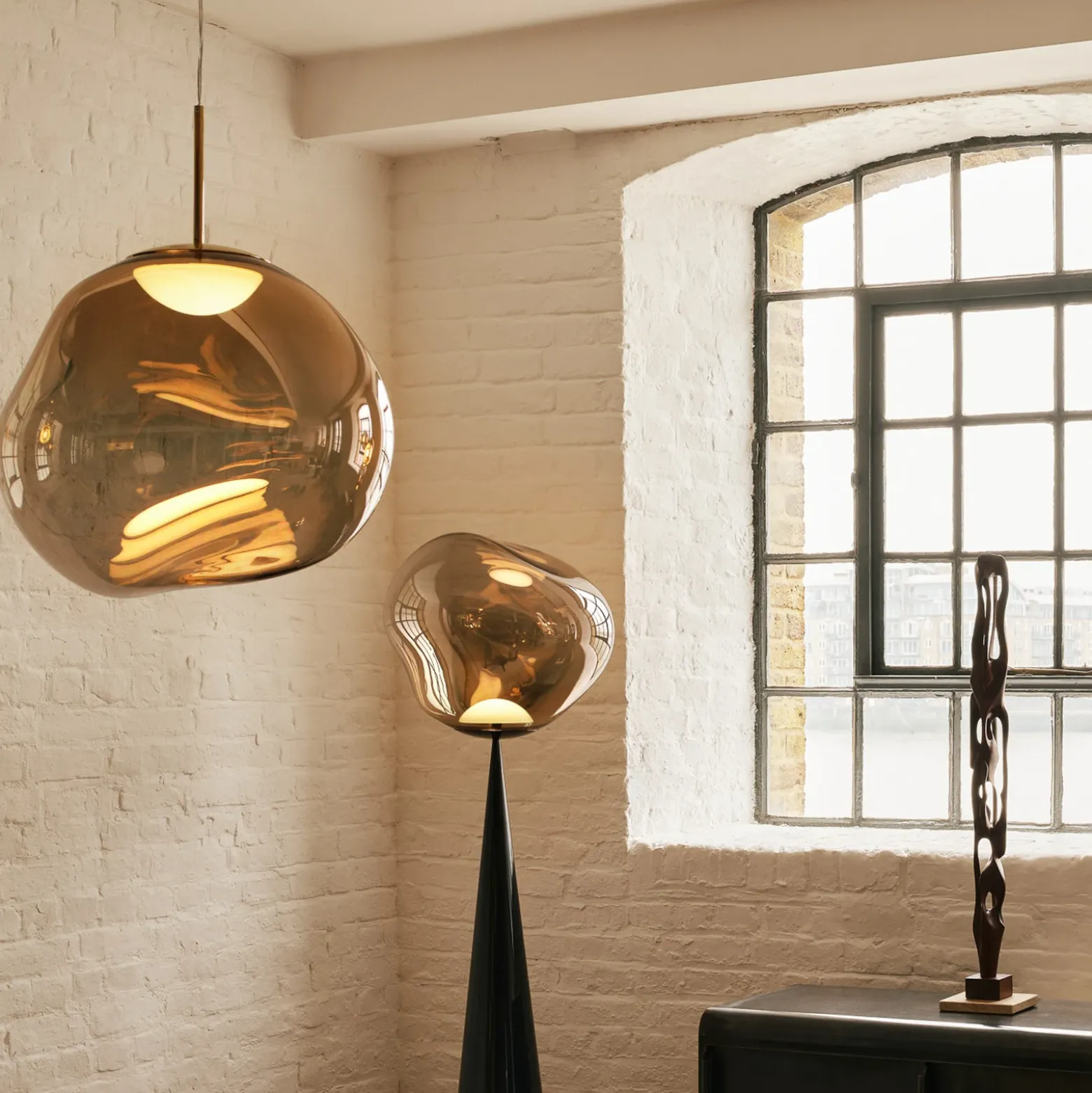 Lámpara colgante LED Melt de Tom Dixon, Ø 28 cm, color bronce