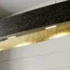 Lámpara colgante LED negra Lio con toques dorados