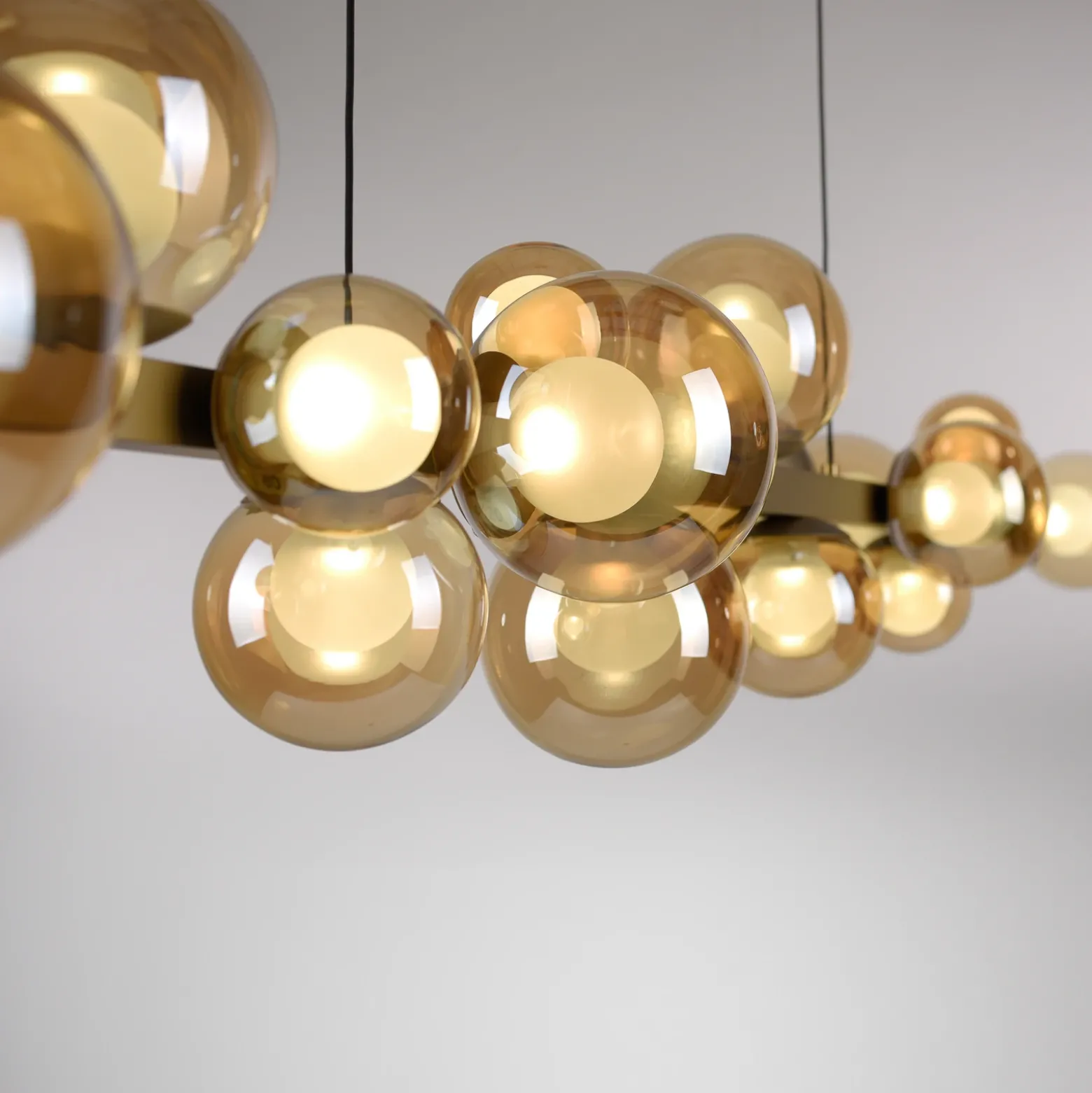 lámpara colgante LED PURE E-Popup, bronce, cristal, CCT, 18 lámparas.