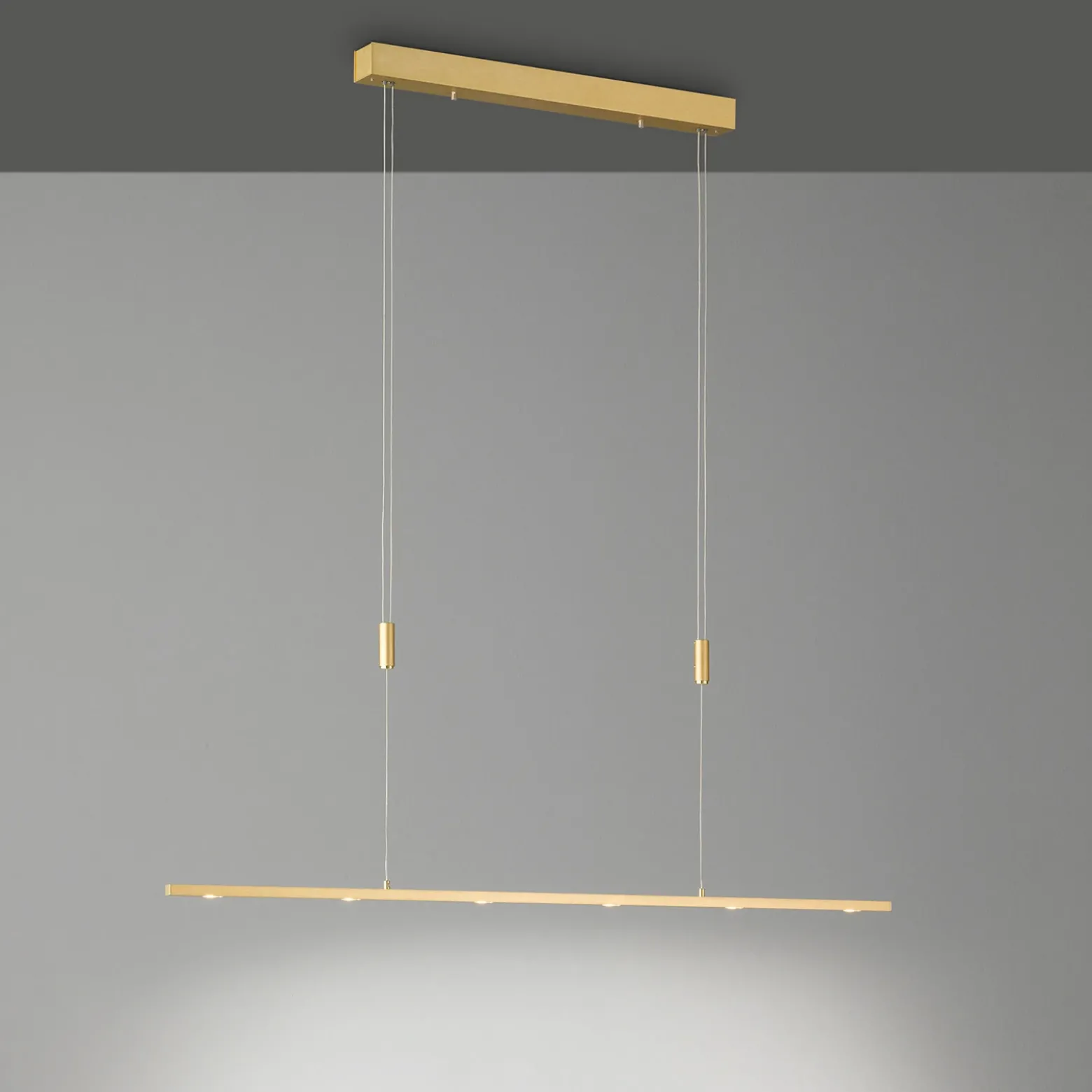 Lámpara colgante LED Quitani Tolu, longitud 119 cm, latón