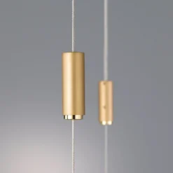 Lámpara colgante LED Quitani Tolu, longitud 119 cm, latón