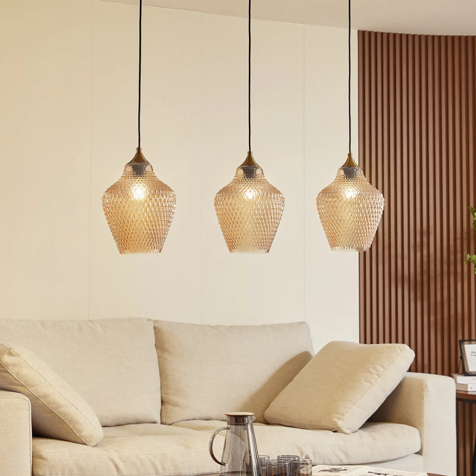 Lámpara colgante Lindby Drakar, Ø 22 cm, 3 luces, ámbar, cristal