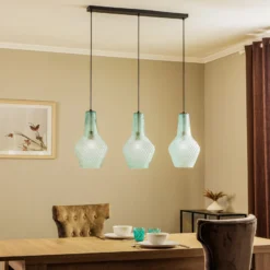 Lámpara colgante Lindby Drakar, 3 luces, azul claro, cristal, Ø 25 cm